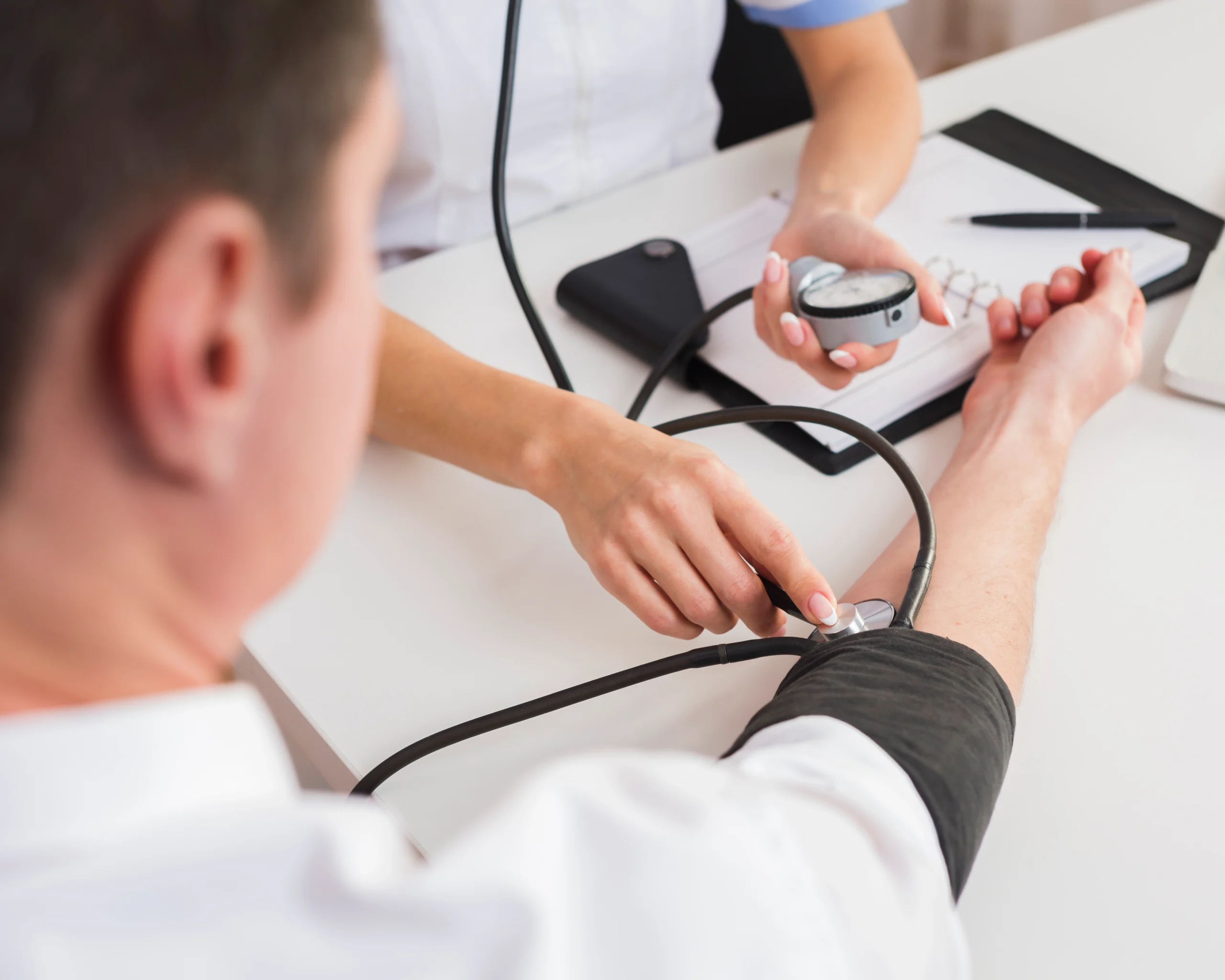 female doctor hands checking patient scaled